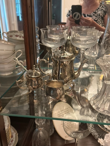 Silver-plated tea and coffee service set on mirrored tray