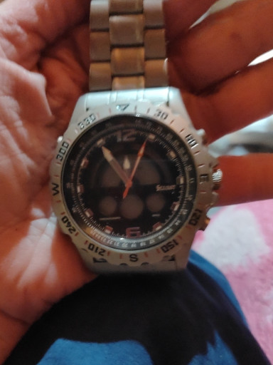 Stainless steel chronograph watch by Stauer, model 'Compendium' or similar