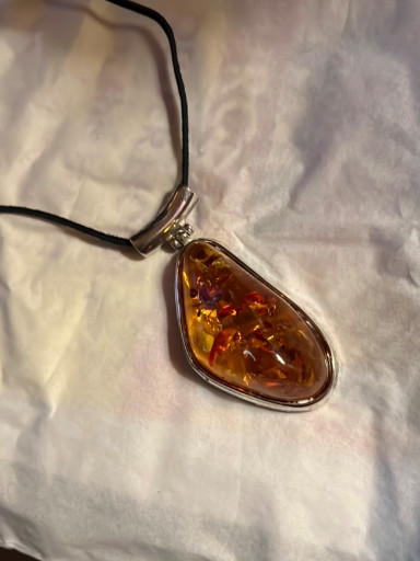 Sterling silver pendant with Baltic amber cabochon
