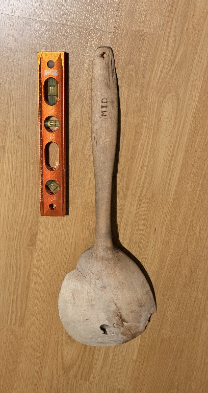 Antique wooden ladle with carved handle. Origin: Norway
