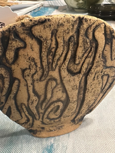 Ceramic pottery vase with coil-style relief decoration and brown glaze