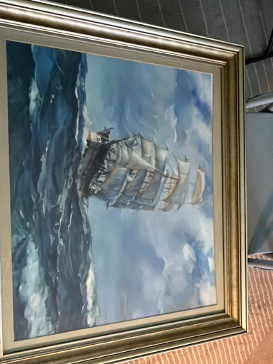 Oil painting depicting a clipper ship at sea in rough waters