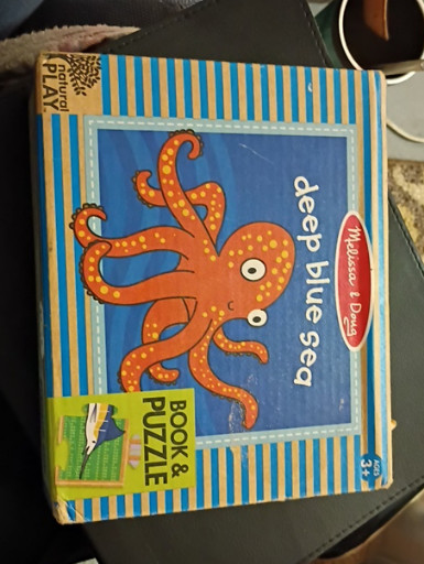 Children's board book with puzzle titled 'Deep Blue Sea' by Melissa & Doug