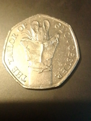 50 pence coin titled 'The Tailor of Gloucester' from the Beatrix Potter series