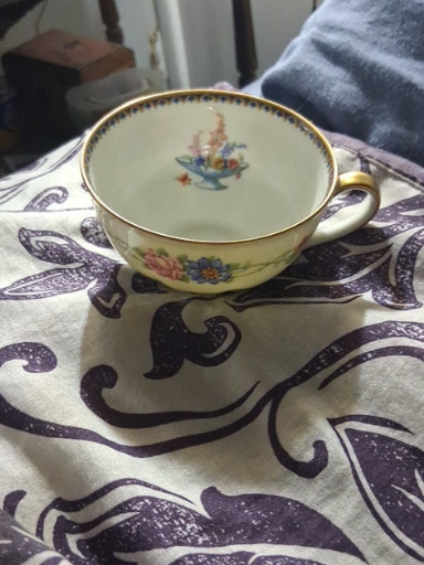 Porcelain teacup with floral decoration by Theodore Haviland, Limoges