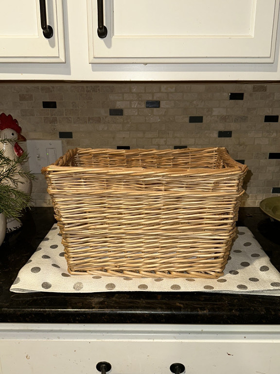Woven wicker storage basket
