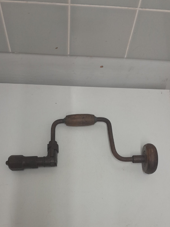 Antique hand brace drill with wooden handle