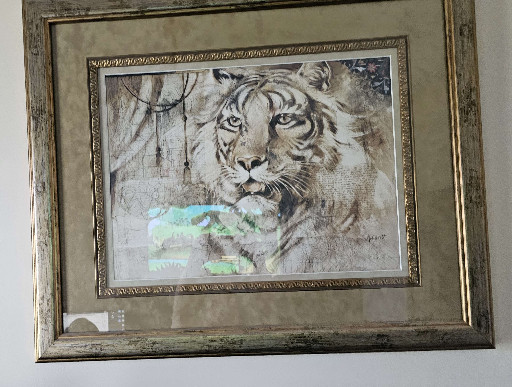 Framed watercolor or mixed-media painting titled 'Back Off!' depicting a tiger portrait by Pat Puttergill