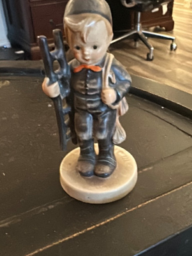 Porcelain figurine titled 'Chimney Sweep' by M.I. Hummel, manufactured by Goebel