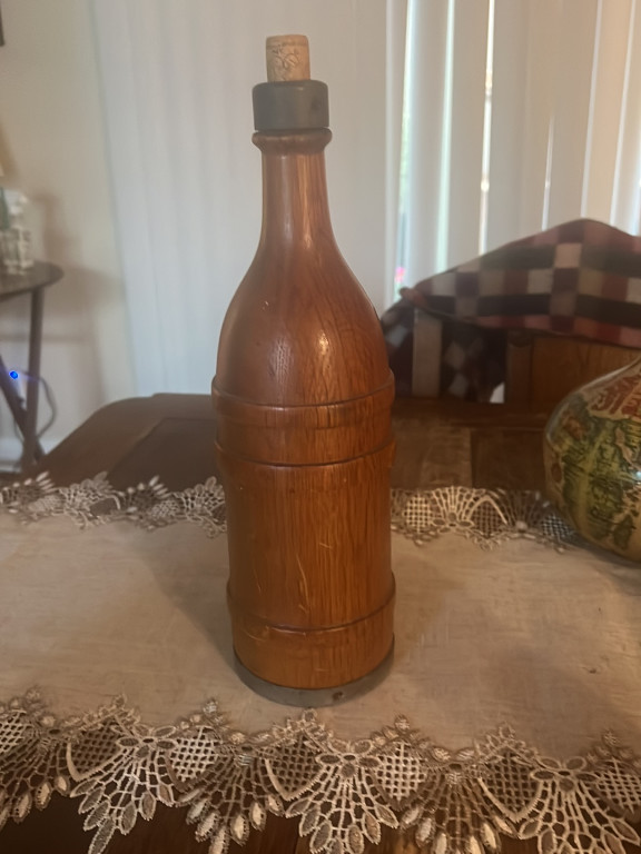 Wooden whiskey bottle decanter with cork stopper