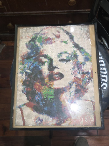 Diamond painting artwork depicting Marilyn Monroe in colorful mosaic style