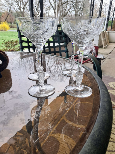 Set of four vintage cut crystal champagne coupes with etched floral design