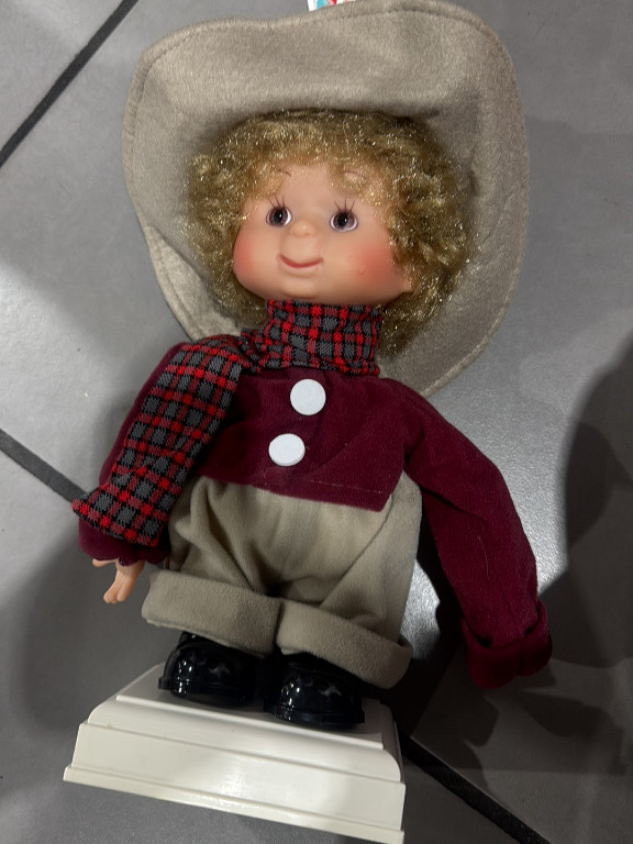 Animated Christmas doll from the 'Undercover Kids' collection by Santa's Best