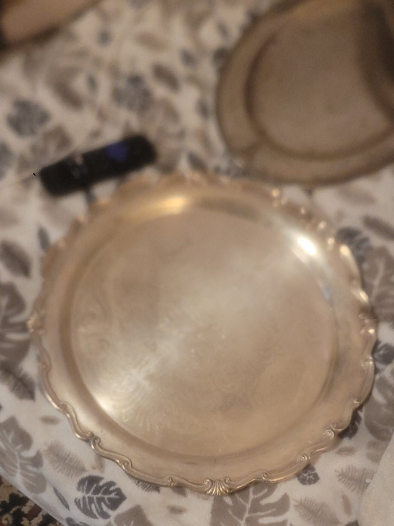 Silver-plated serving tray with scalloped edge