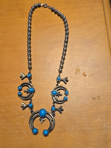 Silver-tone squash blossom necklace with faux turquoise cabochons