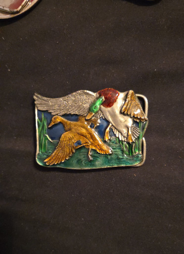 Enameled pewter belt buckle titled 'Mallard Ducks' by Bergamot Brass Works