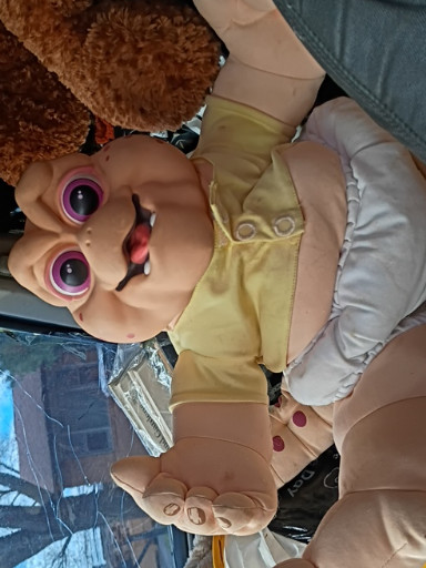 Talking Baby Sinclair plush doll from the TV show 'Dinosaurs' by Hasbro