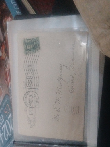 Vintage postcard with 1-cent Benjamin Franklin stamp, postmarked early 1900s