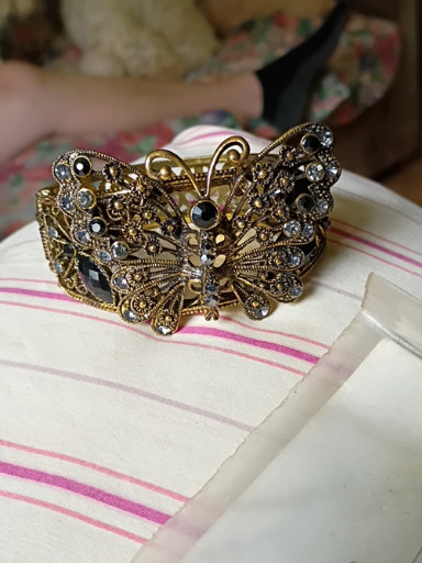 Brass filigree butterfly cuff bracelet with rhinestone and glass cabochon embellishments