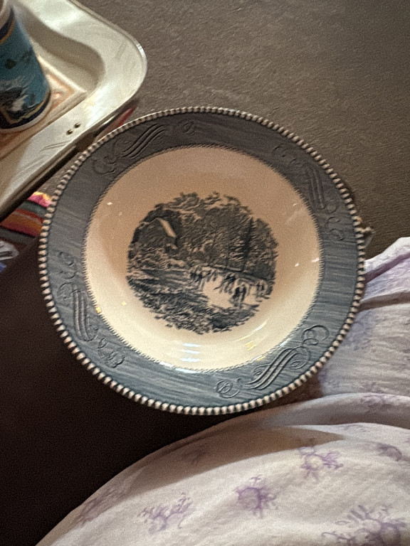 Ceramic soup bowl titled 'Early Winter' by Royal China in the Currier & Ives pattern