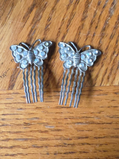 Pair of vintage metal butterfly hair combs with rhinestone embellishments