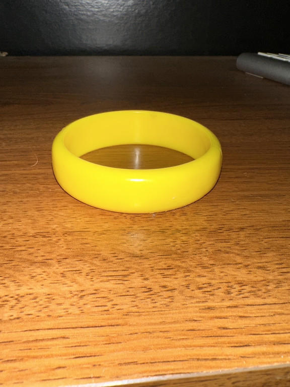 Vintage yellow plastic bangle bracelet
