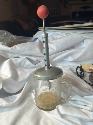 Vintage glass measuring cup food chopper with spring-assist mechanism and red wooden knob