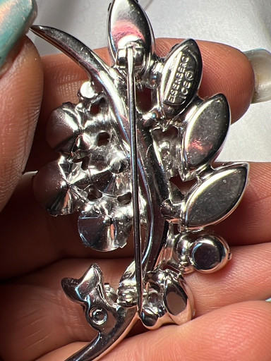 Silver-tone rhinestone floral brooch signed 'Eisenberg Ice'