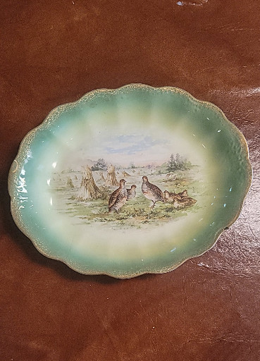 Porcelain oval platter with hand-painted game bird scene by Sterling China Company