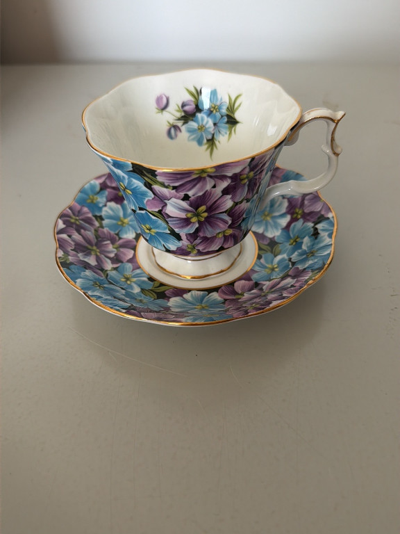 Bone china teacup and saucer set titled 'Angela' by Royal Albert
