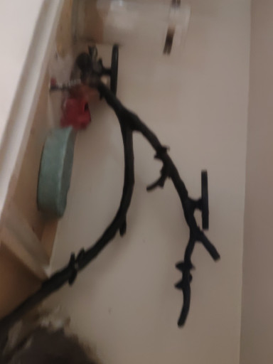Wrought iron candelabra in naturalistic branch form with 8 candle holders