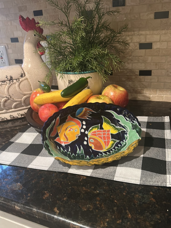 Hand-painted ceramic bowl with fish motif, Mexican folk art