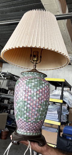 Ceramic table lamp with woven basket-weave pattern in pink and green tones