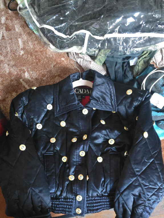 Leather quilted bomber jacket by Escada with gold buttons