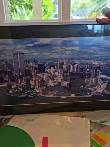 Framed photograph titled 'New York City Skyline with World Trade Center Twin Towers'