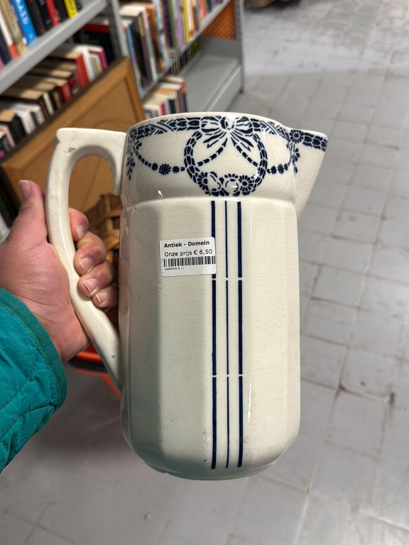 Ceramic pitcher titled 'Thais' by St. Amand et Hamage