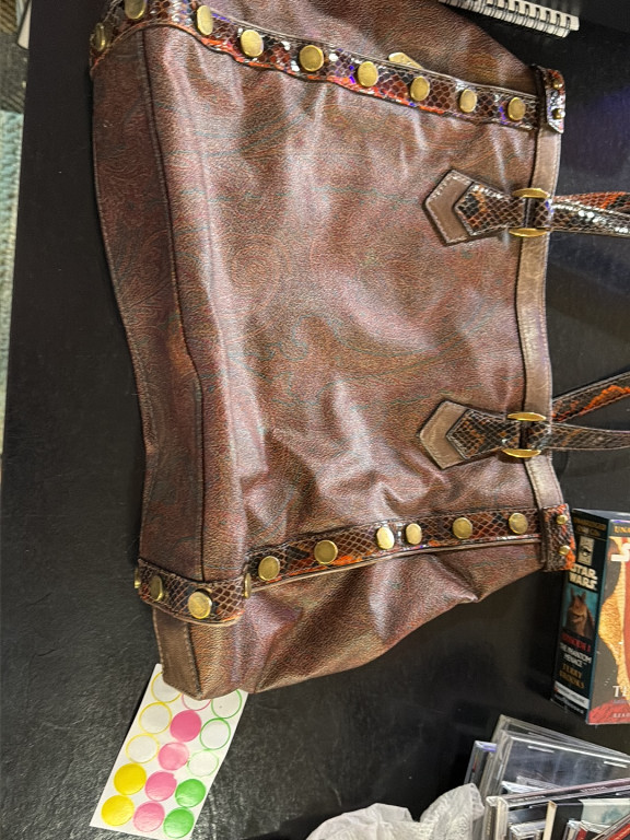 Leather handbag with studded trim and snake-embossed details by Etro