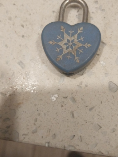 Brass heart-shaped padlock with snowflake design