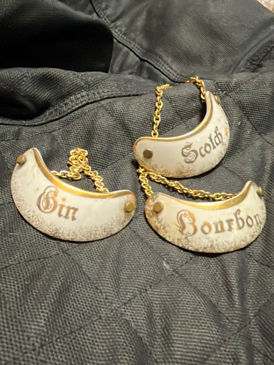 Porcelain decanter labels for 'Gin', 'Scotch', and 'Bourbon'