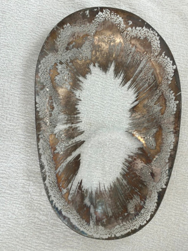 Glass serving platter with 'Atomic Splash' design by Dorothy Thorpe