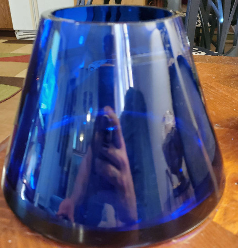 Hand-blown cobalt blue glass vase with conical shape