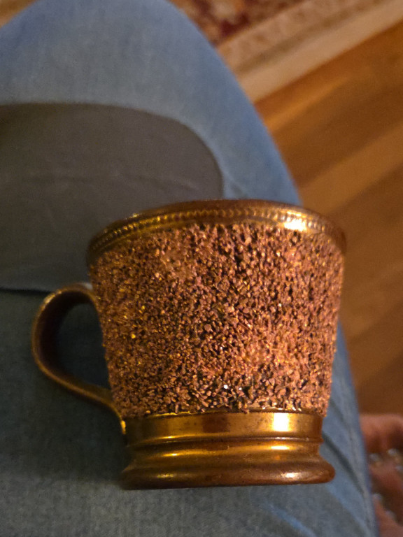 Copper lustre mug with raised textured decoration