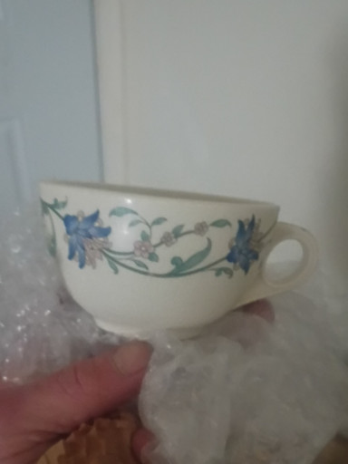 Porcelain teacup with blue floral decoration, 'Tropic' pattern by Mayer China