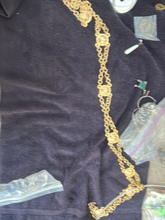 Gold-tone metal chain necklace with CC logo stations by Chanel