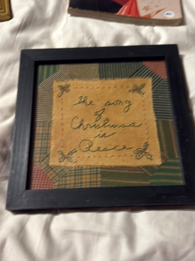 Framed primitive hand-stitched sampler titled 'the joys of Christmas in of family'