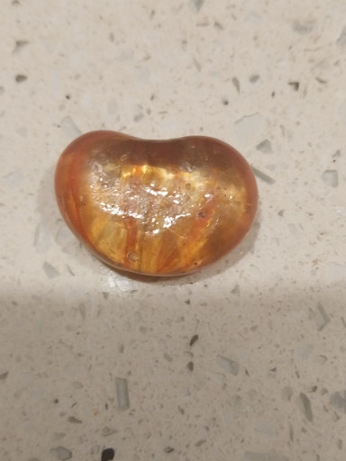 Polished golden healer quartz heart-shaped crystal
