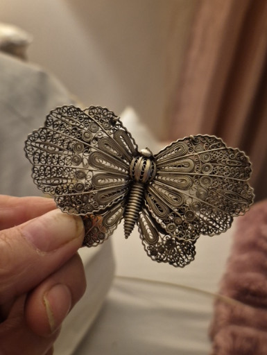 Silver filigree butterfly brooch