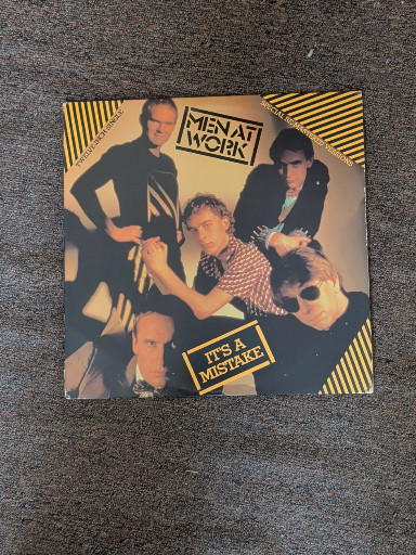 Vinyl 12-inch single titled 'It's A Mistake' by Men At Work