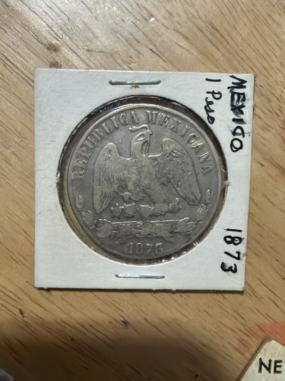 Moneda de plata de 1 Peso mexicano de 1873 de la ceca de Potosí