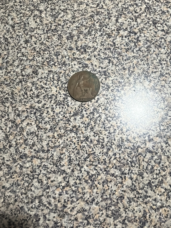 Bronze one penny coin from Great Britain featuring Britannia